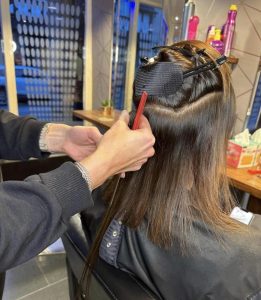 Placing the ‘sandwiches’ of hair 